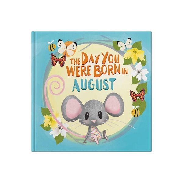 Front cover of book in a seagrass tray. Playful, illustrated mouse sat down surrounded by bees, butterflies and gladioli flowers.