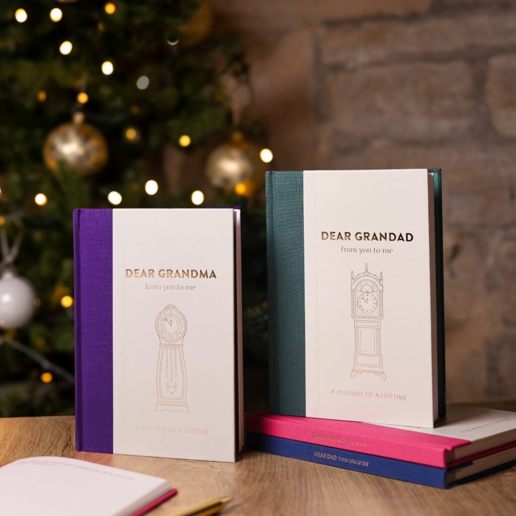 Dear Grandma and Dear Grandad memory journals by Christmas tree.